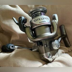 Shimano 1000FG Silver and Black Reel